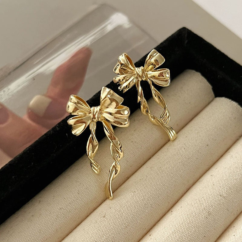 Golden Bow Statement Earrings