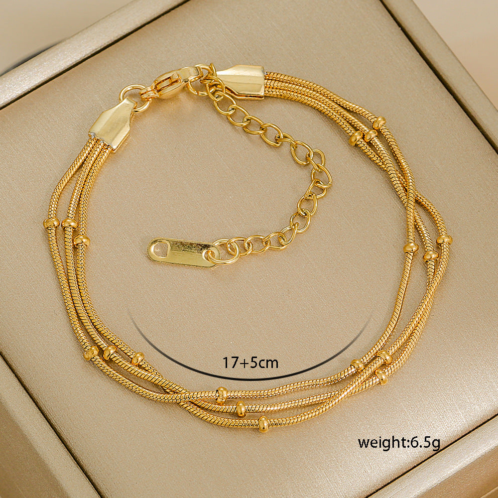 Elegant Multi-Strand Gold-Tone Bracelet