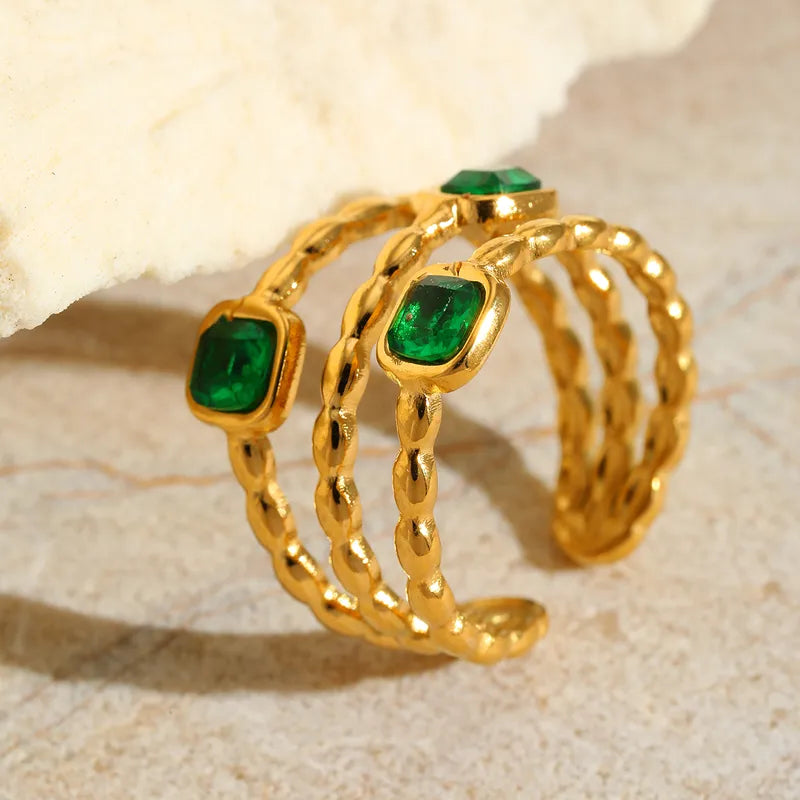 Emerald Glow Triple-Band Ring